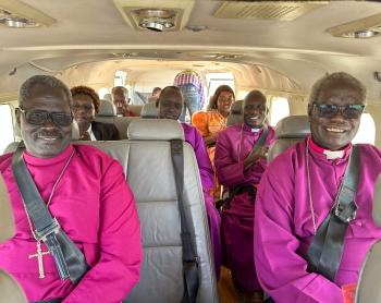 Bishops in the plane ready to fly with MAF