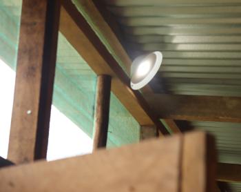 A waiting hut room lit by solar light from MAF Technologies.