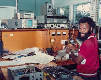 A man fixing a radio