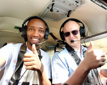 Pilot Peter Griffin and Godfrey Maro