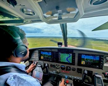 Ricky Poki flying MAF Plane delivering services to the remote communities around Balimo.