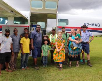 The Rowley family outside MAF plane