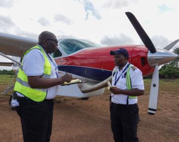 Pilot Amos at airstrip
