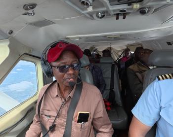 Evangelist Elisha Moita and pilot Peter Griffin in the cockpit of Cessna 208