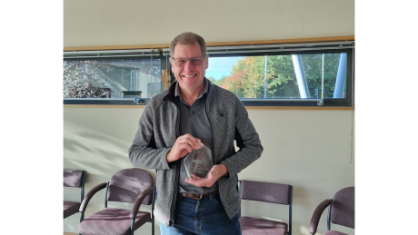 Andy Hedley-Smith poses with the Larry Heintz Safety Award