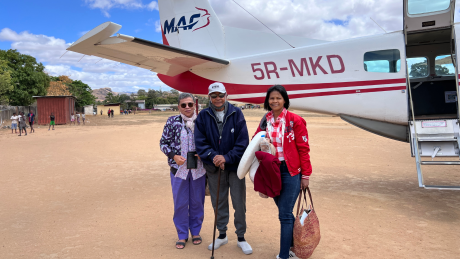 Jean Celien, wife and niece in front of MAF plane in Mandritrsara