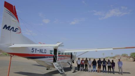 CURE medical team with MAF Kenya Pilot Sam Johnston at Lodwar airstrip