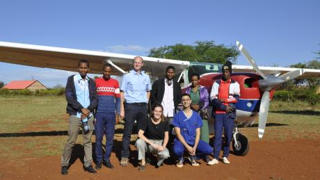 From left: Basil Ombay, John Danieli, MAF Pilot Peter Griffin, Jacob Peter, Rehema Matfari, Kyrillos, Tumaini and Janneke Kampherbeek at the Haydom Airstrip in Tanzania