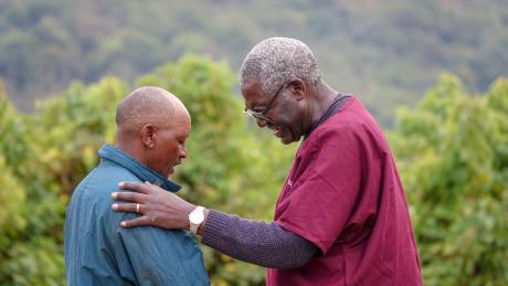 Dr. Mandieka Engages in Prayer with Maasai Man Embracing Christianity