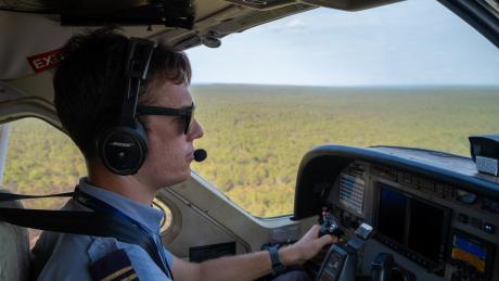 MAF pilot flying plane