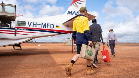 Passengers approaching aircraft