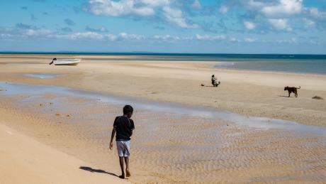 People on beacg at low tide