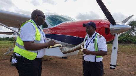 Pilot Amos at airstrip