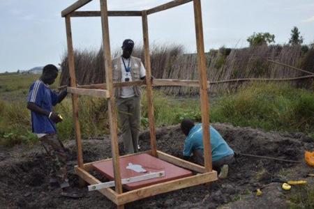 Samaritan's Purse constructing a latrine