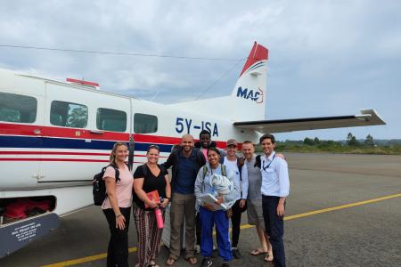 Missionaries from Community Church Virginia posing at Migori Airstrip