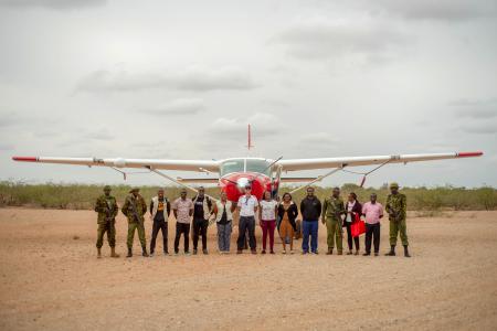 From Left: Anthony Muthuri, Adan Ishaq, Victor Omito, Brian Mtiva, Dr Peter, Sharon Muchoki, Capt Daniel, Grace Ochieng’, Pst Emmy, Dr Philemon, Corp Okinda , Isabella MOHI, Okumu Ezekiel and Pst Gabriel Njoroge at Bura airstrip.