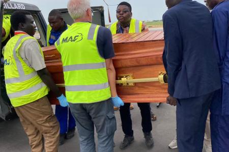 Transporting body of President Obed