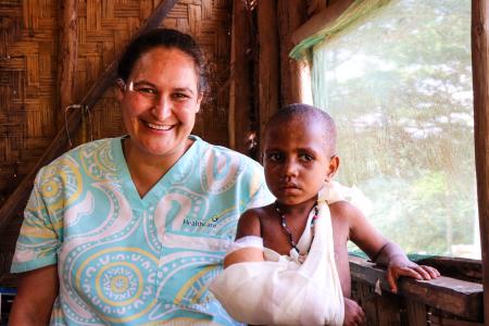 Marino Vickers and the Health Patrol team attending to patients in Yambaitok. Photo by Kowara Bell.