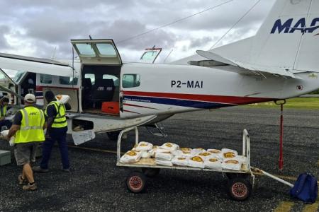 MAF plane gets ready and flies from Buka to Nissan Island