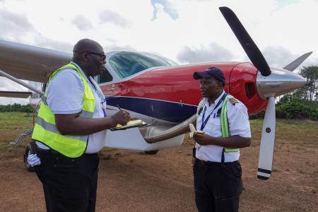 Pilot Amos at airstrip