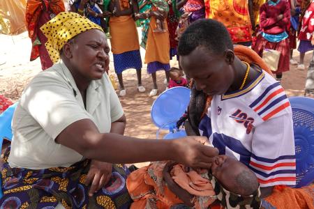 Baby Maiko receives his first vaccinations