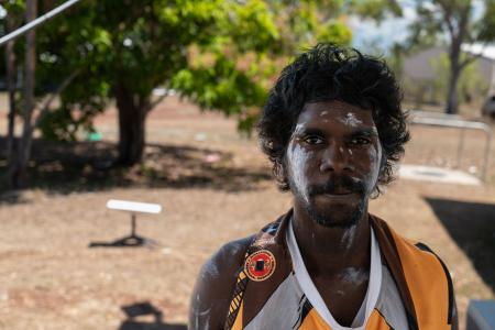 Young Yolngu man looking into camera