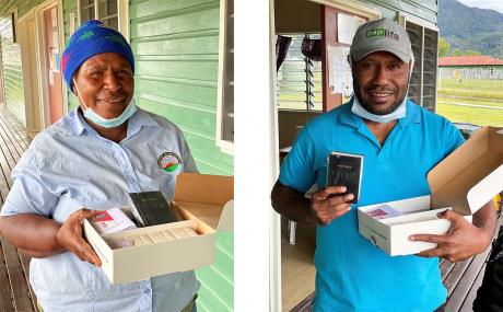 Nurse and Dentist from the Telefomin Hospital with Bible Soap Boxes