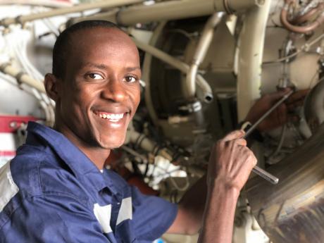 Engineer Arsene working on C208 in Chad