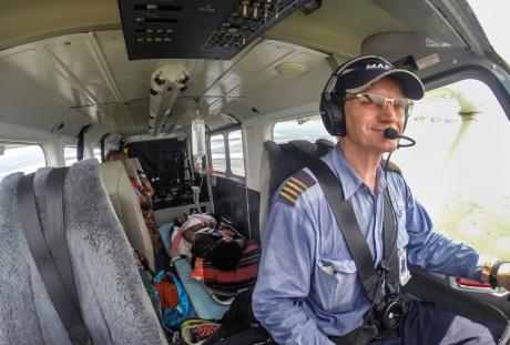 Paul Woodington flying a medevac patient