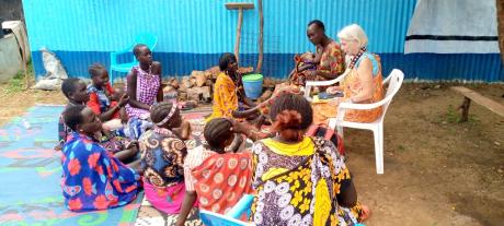Patricia teaching discipleship to a group of Toposa women