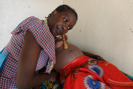 A nurse from Haydom Hospital examining a pregnant woman during the Gorimba mobile clinic.