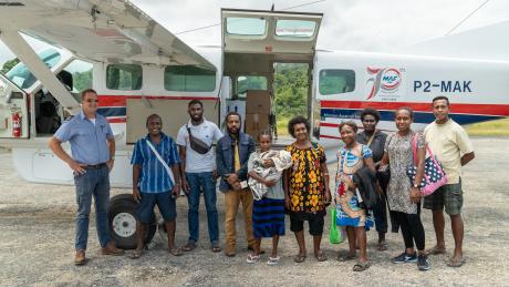 Braun Memorial Hospital team poses for a photo with MAF pilot Arjan Paas before leaving to work at the Indagen Health Clinic.