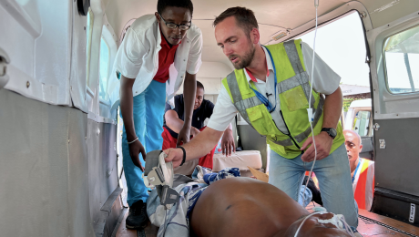 Dr Herbert and Wouter preparing patient for flight