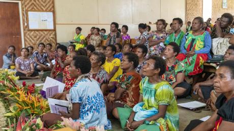 many pastor women in a church building looking focussed to listen to what's taught