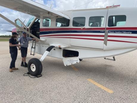 Melissa Higgins with pilot Joe Knighton in Arnhem Land