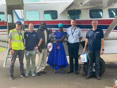 The team from MAF and AMI Expeditionary Healthcare that helped make the flight a reality