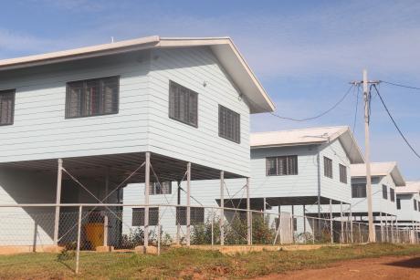 A wide shot of newly buit permanent houses at the SDP Balimo Hub.