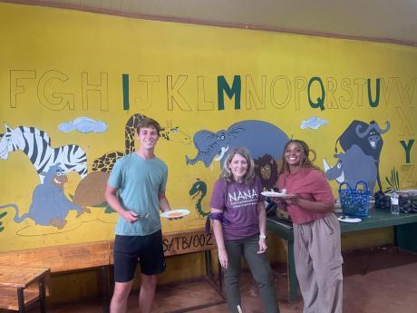 Happy missionaries paint a Mural for the children at City of Hope.