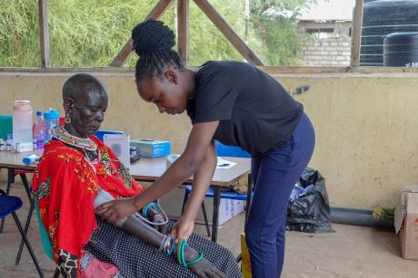 A nurse monitors the blood pressure of a Samburu woman during the medical camp.