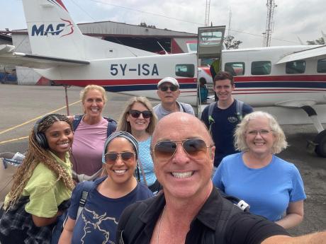 Brian Kirby, a board member at HopeCo with a team of missionaries at Migori Airstrip.