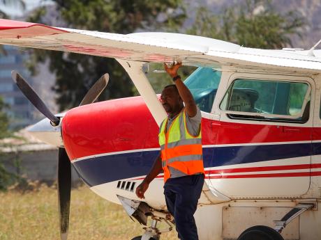 Heri conducts a thorough pre-flight inspection to ensure the optimal functioning of the aircraft before takeoff.