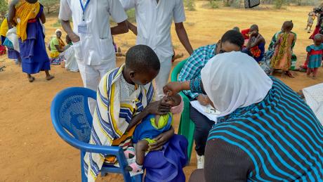 A nurse administers a vaccine to a child during a mobile clinic in Lesirwai.
