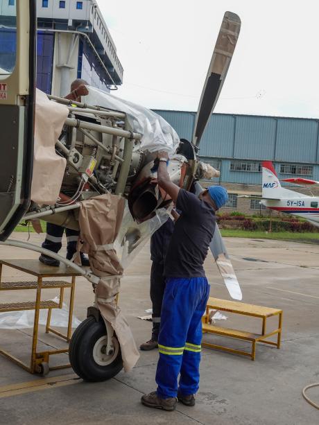 Gift lends a hand during the propeller painting job