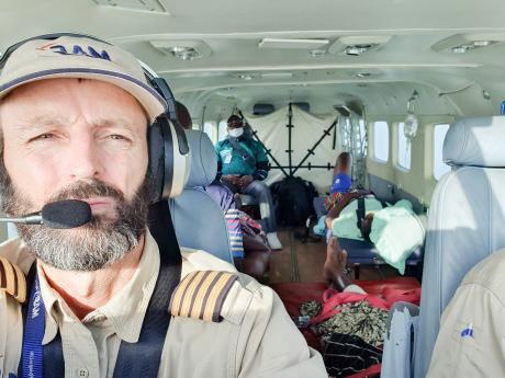 MAF pilot Brad Ballin carries out the second flight of the injured from Macenta to Conakry