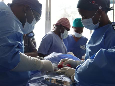 Dr. Sterman Toussaint Director for Clinical Services and Director for Medical Education with Partners in Health and his team during operation time