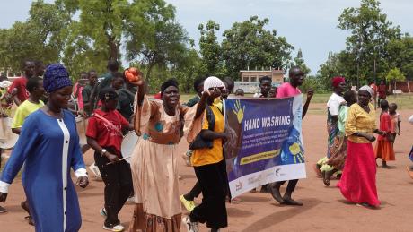 Refugees entertain community members