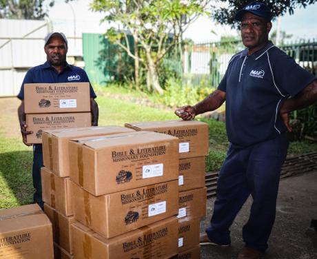 The donated printed Bible boxes loaded by MAF Techologies staff.