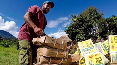A man sorts cargo