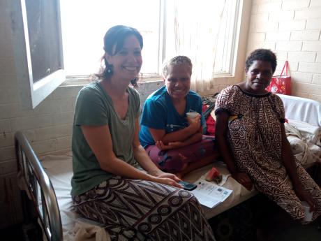 Mahela Schadegg donating audio Bible to mothers at the Goroka General Hospital