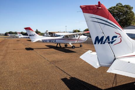 A fleet of training aircraft on an aerodrome